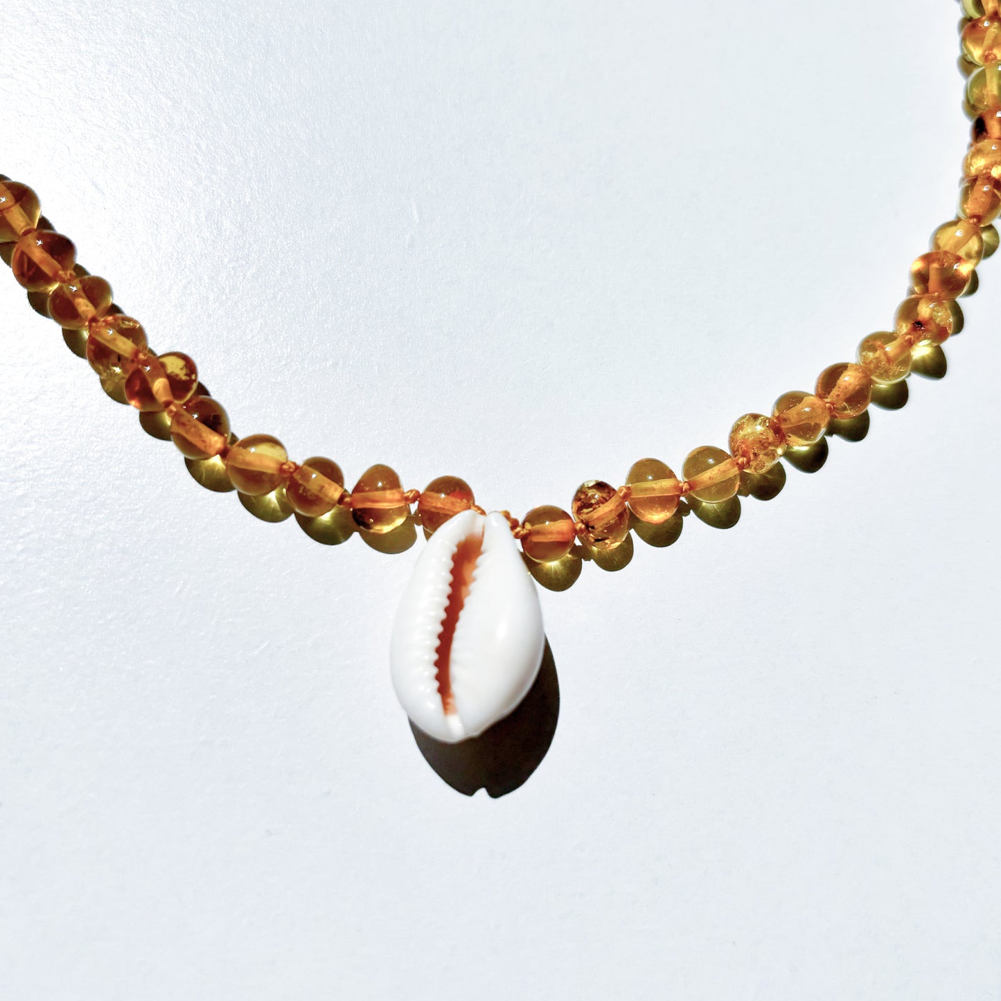 Amber Necklace with Cowrie Shell - Honey- 40cm