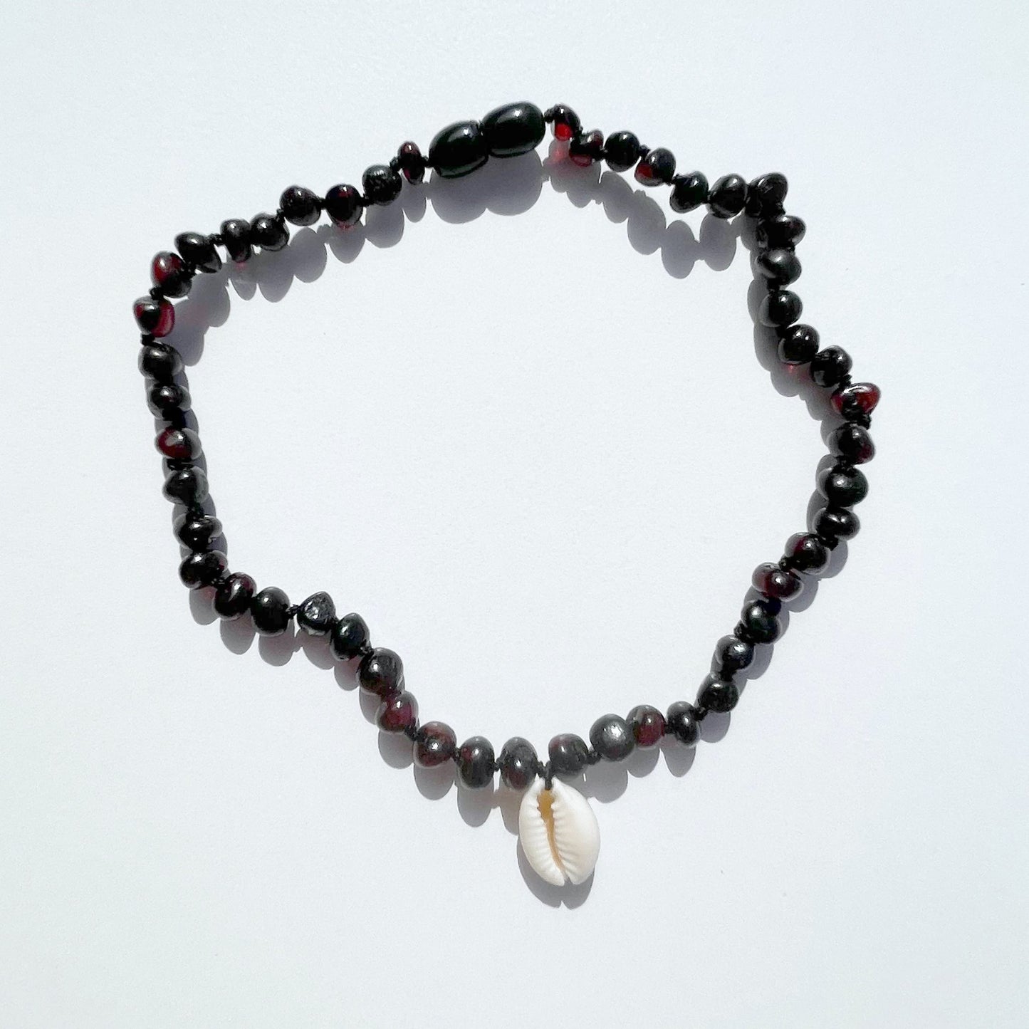 [OUTLET]  Amber Necklace with Cowrie Shell - Cherry - 32m